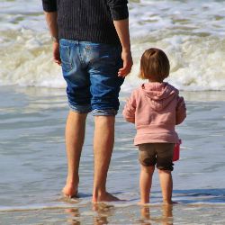 Father&daughter on beach